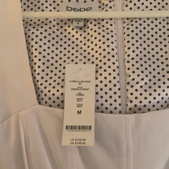 NWT, Bebe white A-line dress size medium. Zips up back, sleeveless - Picture 7 of 7